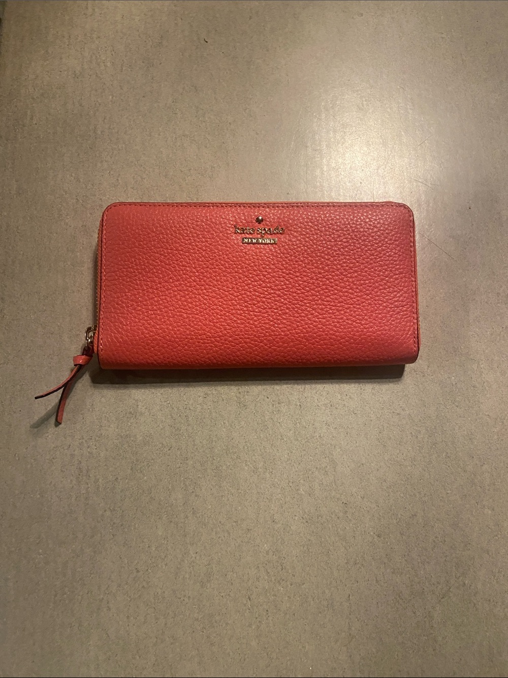 kate spade Coral Red Zip-Around Pebbled Leather Wallet